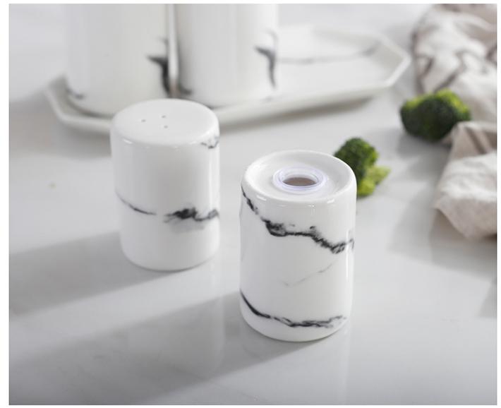White Ceramic Salt And Pepper Shakers